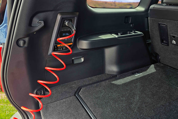 NSV Smart Air Compressor Kit installed in Toyota Prado J250 — in-vehicle lifestyle shot